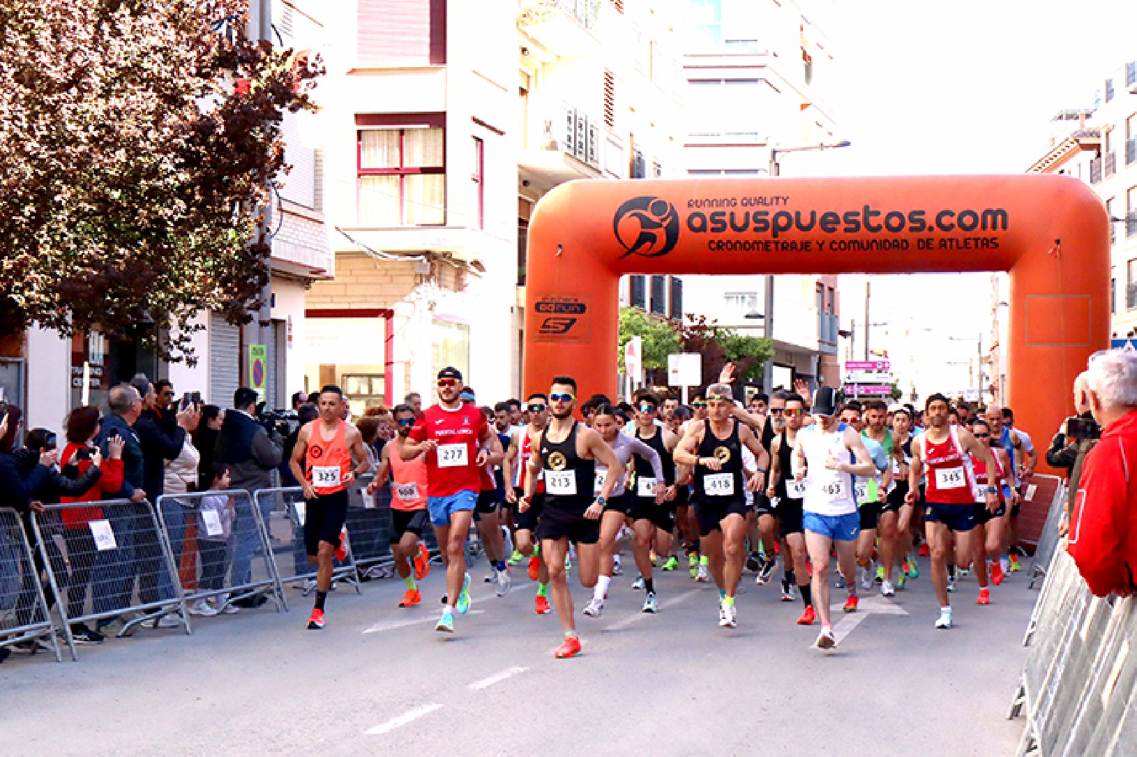 Marta Belmonte y Mario Molina ganan la carrera popular de las fiestas del barrio de San José